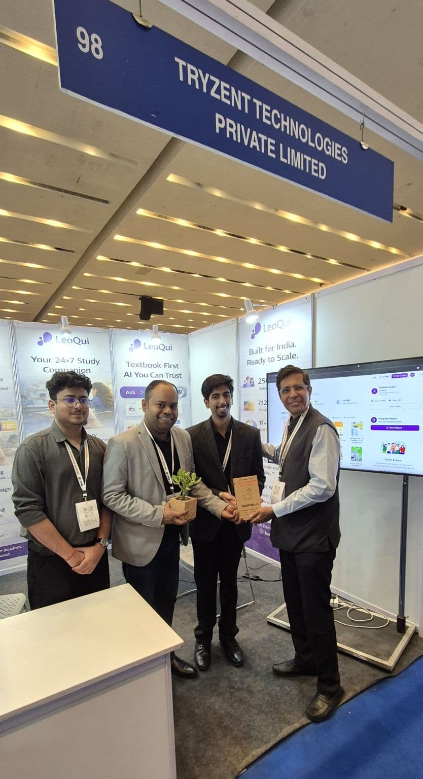 The Tryzent team receiving a memento at their Bharat Bodhan AI Conclave stall