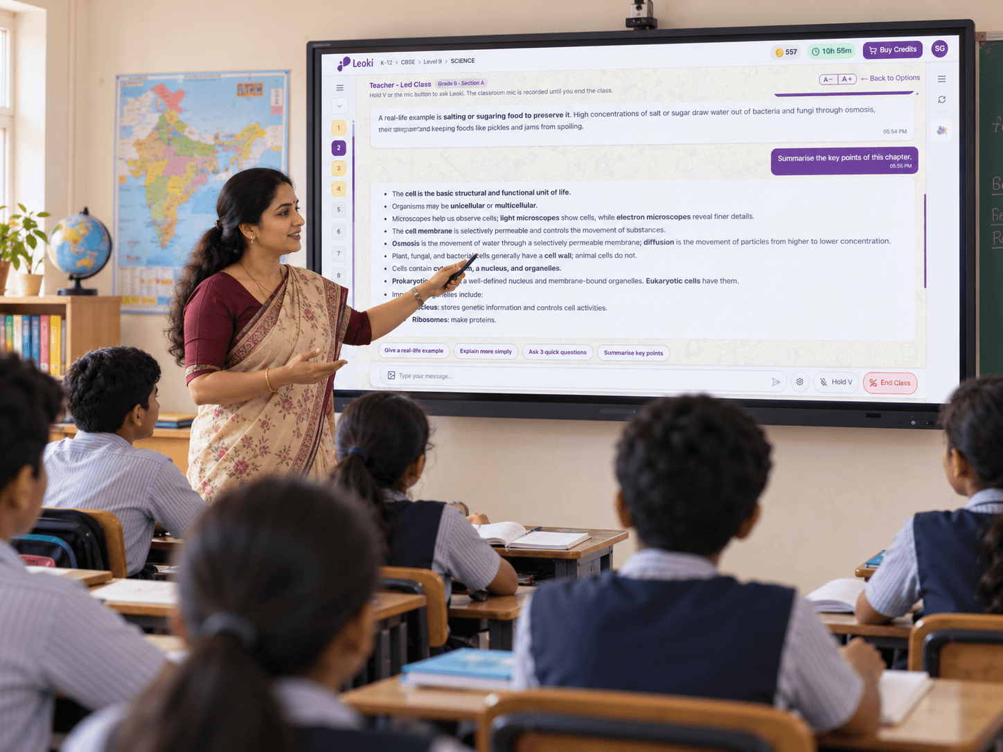 A teacher leading a class, with Leoki's Teacher-Led Class summary on the classroom screen